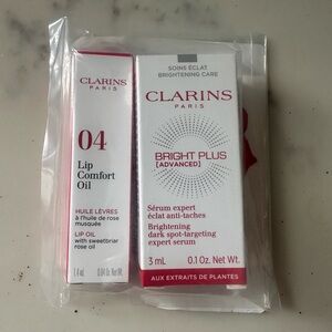 Clarins Bright Plus Advanced Serum & Lip Comfort Oil - White and Pink